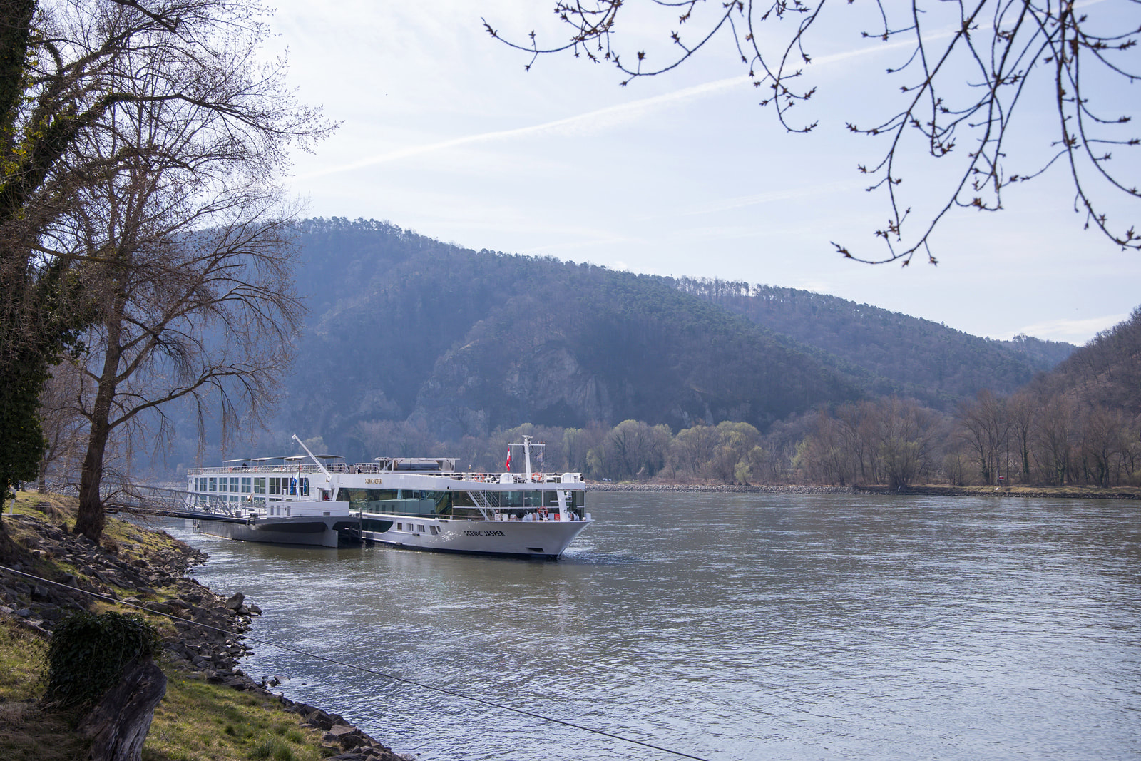 River cruise through scenic European landscape